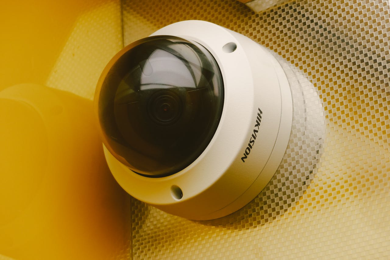From below of modern camera for recording audio and video in building for security and protection